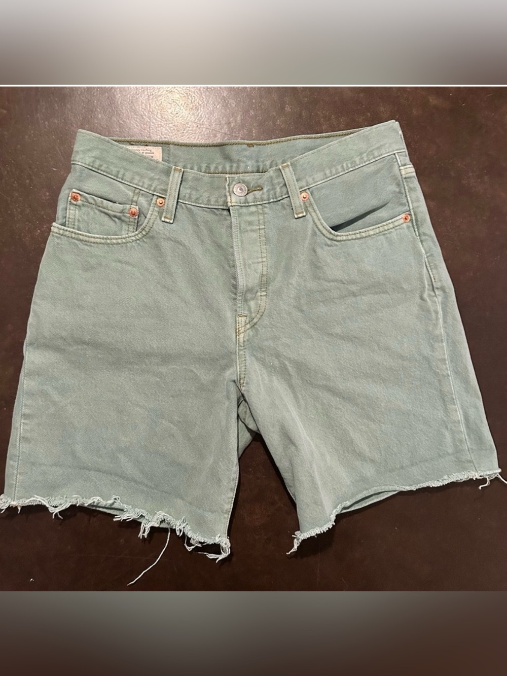Levi’s women 501 mid thigh turquoise green shorts, raw hem, button fly, size 27